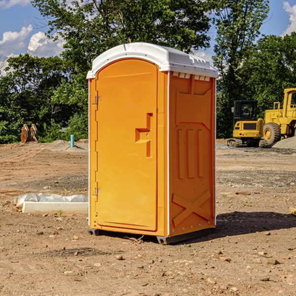 how often are the portable restrooms cleaned and serviced during a rental period in Tate OH